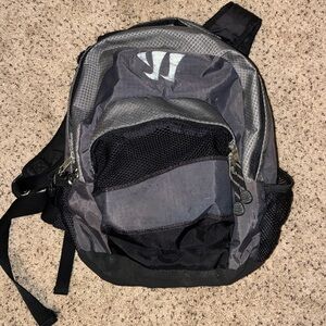 Gray and Black Warrior Lacrosse Backpack with stick compartment